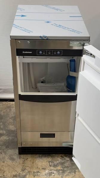 Scotsman-style undercounter residential ice machine, the type Camelback Ice Co. services.